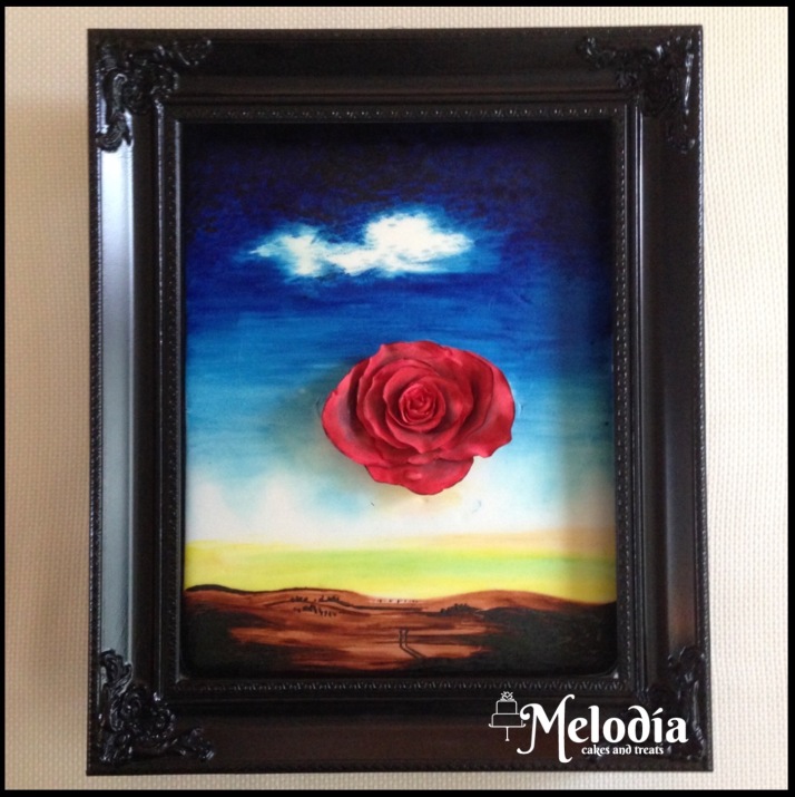 meditative rose dali painting on a cake food coloring gum paste